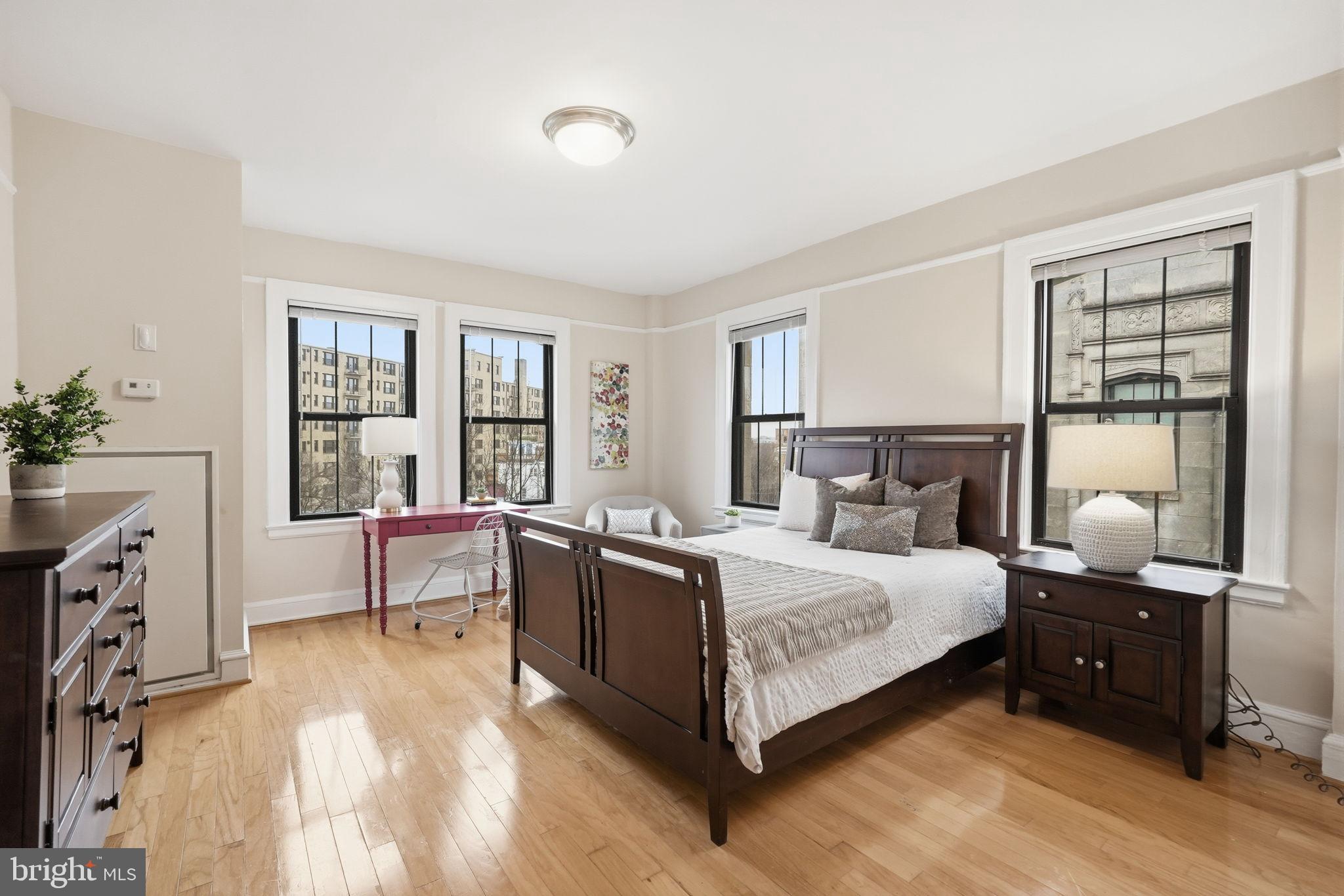 1613 Harvard Street Northwest, Unit 501 Washington, DC 20009 - Photo 10 of 25 Bright and airy bedroom with city views.