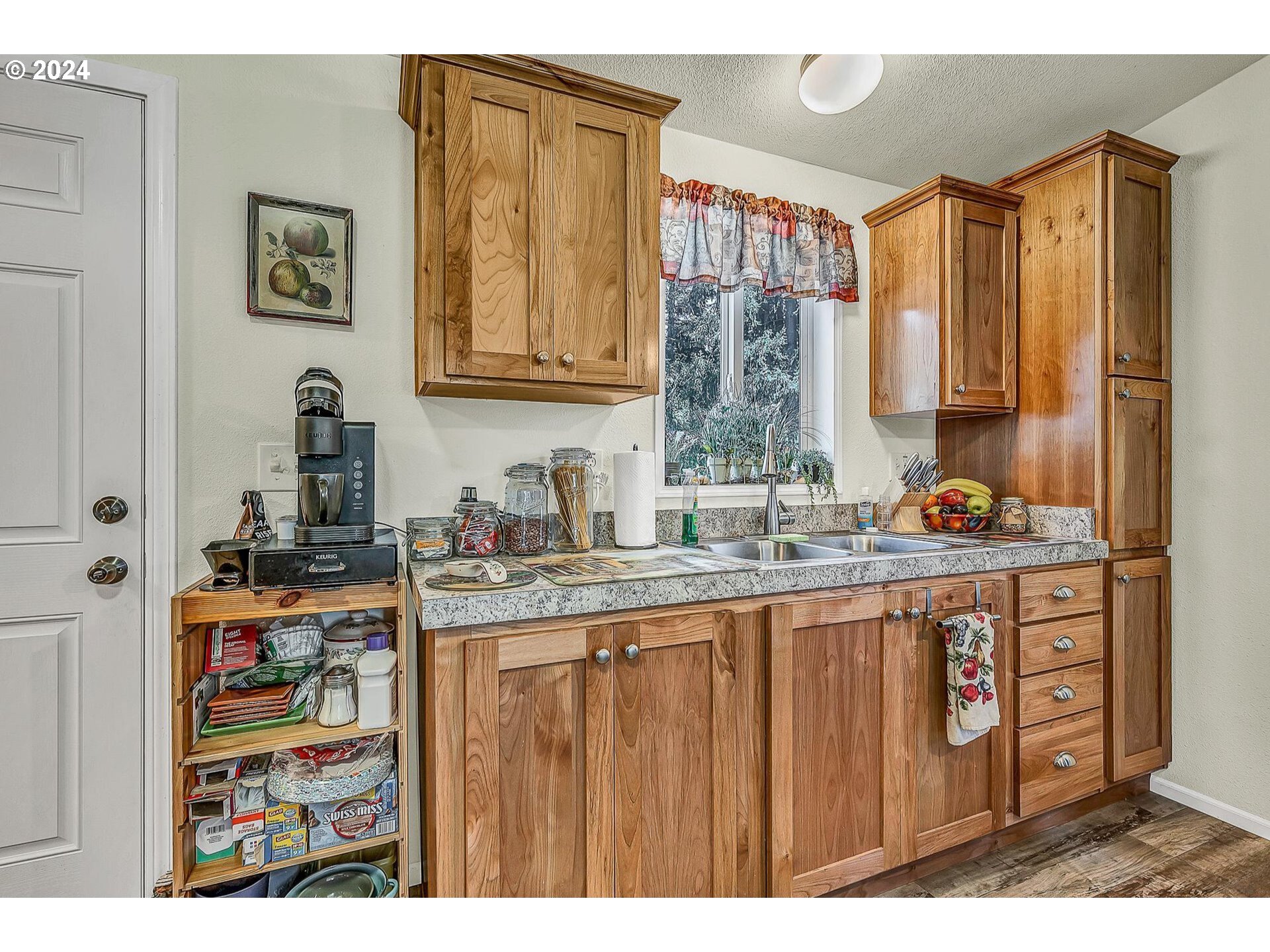 69911 Walker Road Rainier, OR 97048 - Photo 11 of 26 a kitchen with stainless steel appliances granite countertop a sink and cabinets