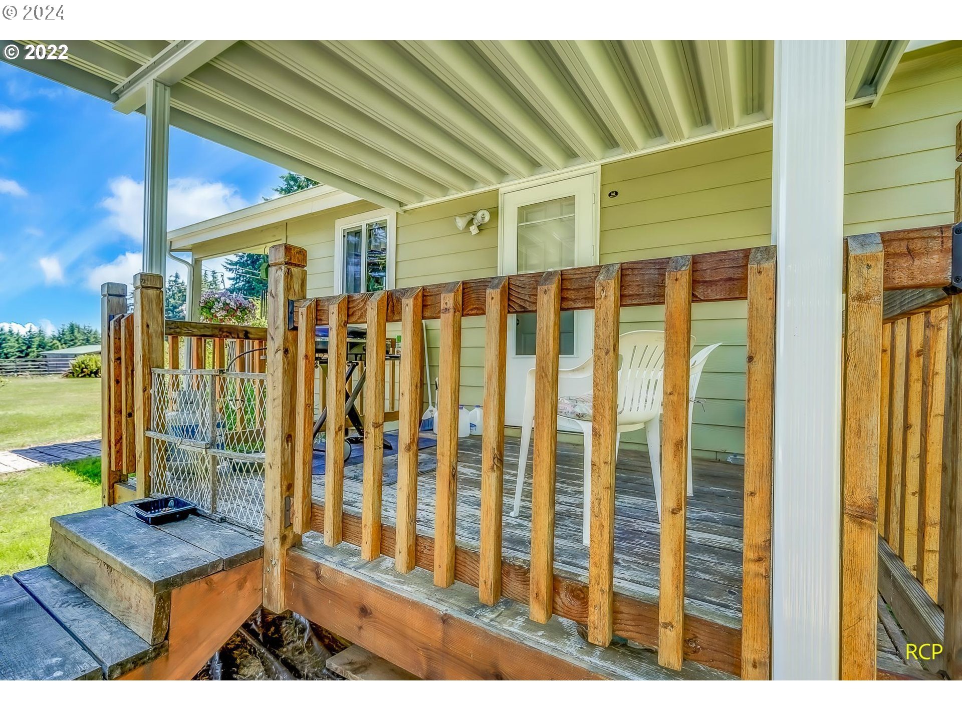 69911 Walker Road Rainier, OR 97048 - Photo 17 of 26 a view of a balcony with wooden floor and floor