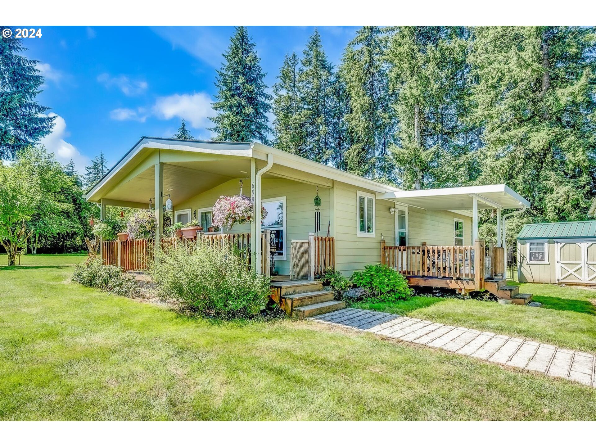 69911 Walker Road Rainier, OR 97048 - Photo 25 of 26 a view of a house with a yard