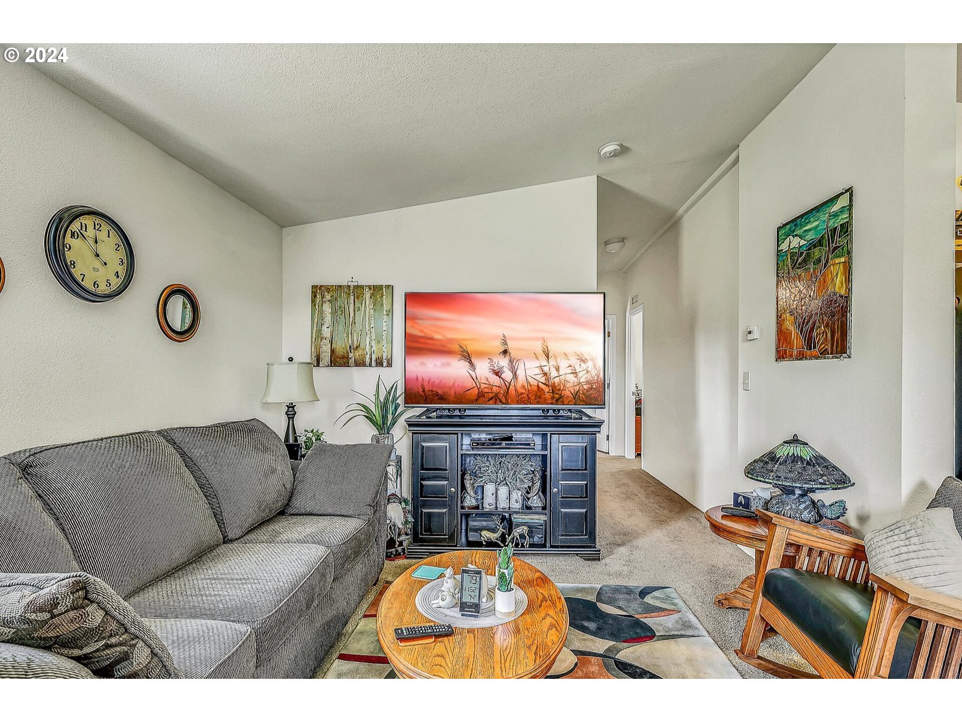 69911 Walker Road Rainier, OR 97048 - Photo 8 of 26 a living room with furniture and a flat screen tv