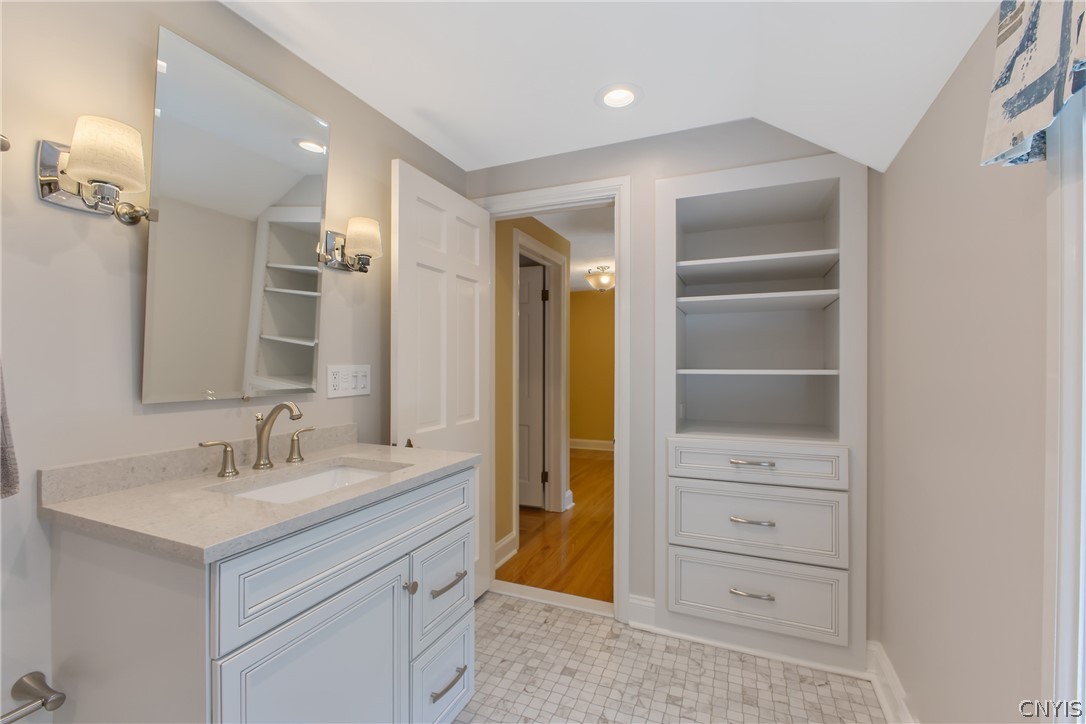 31 Lyndon Road Fayetteville, NY 13066 - Photo 29 of 47 Main bath was totally redone too in 2023. Classic, basket weave tile
matches the master bathroom.