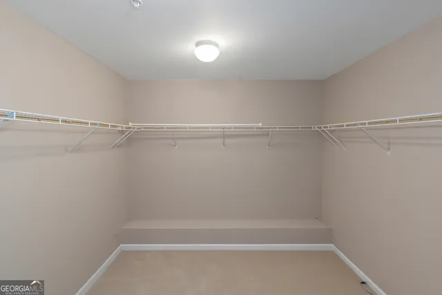 a view of a room with racks on the wall