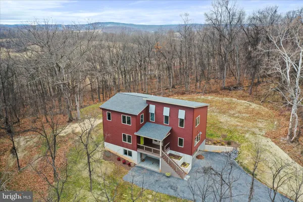 a view of a chairs and table in the terrace