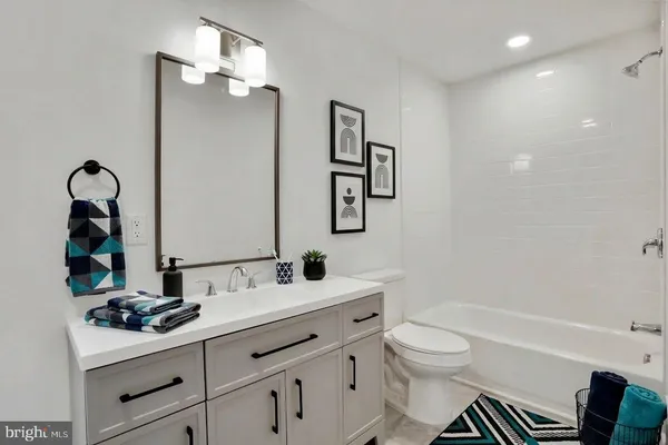 a view of an empty room with stairs