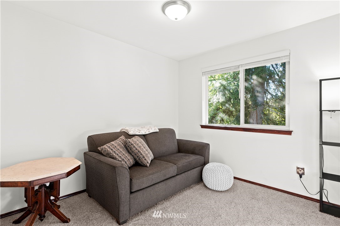 1626 93rd Place Southwest Everett, WA 98204 - Photo 14 of 25 a living room with furniture and a window