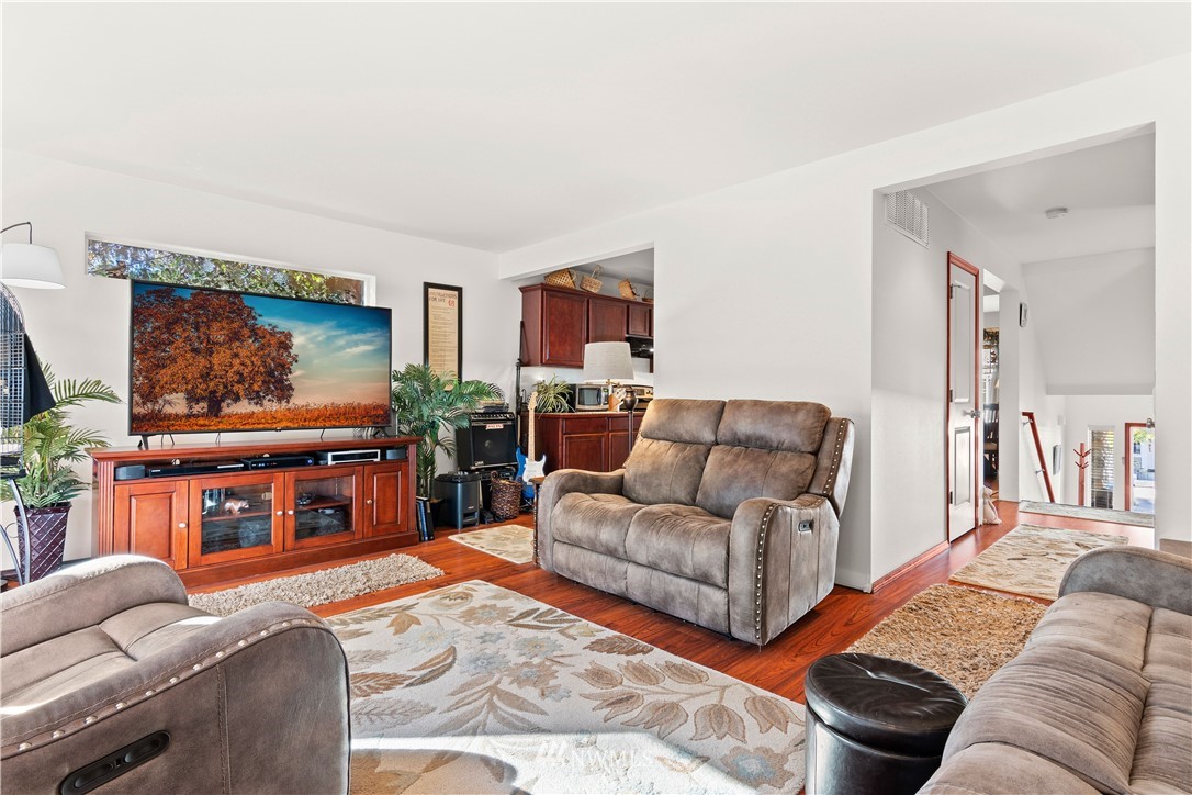 1626 93rd Place Southwest Everett, WA 98204 - Photo 4 of 25 a living room with furniture and a flat screen tv