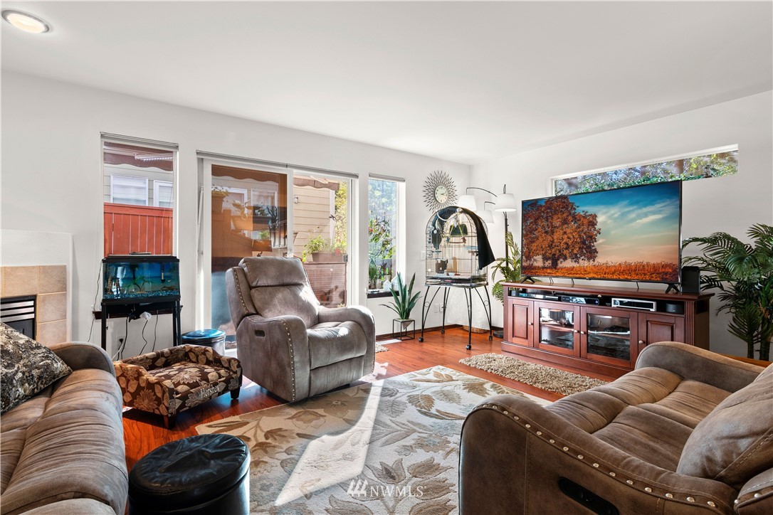 1626 93rd Place Southwest Everett, WA 98204 - Photo 5 of 25 a living room with furniture and a flat screen tv
