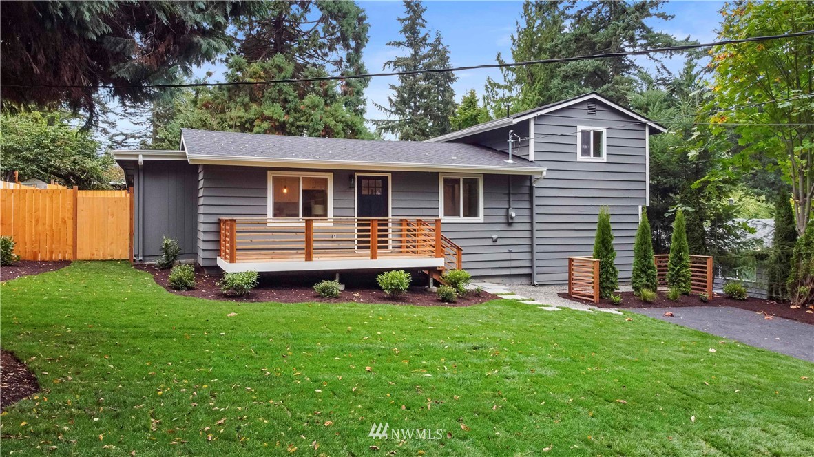 15 231st Street Southeast Bothell, WA 98021 - Photo 1 of 26 a front view of a house with a yard porch and outdoor seating