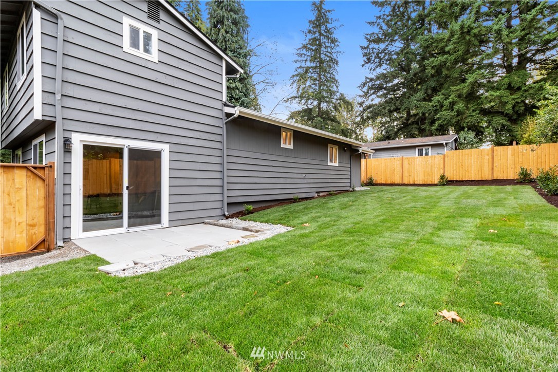 15 231st Street Southeast Bothell, WA 98021 - Photo 23 of 26 a view of a backyard with a large tree