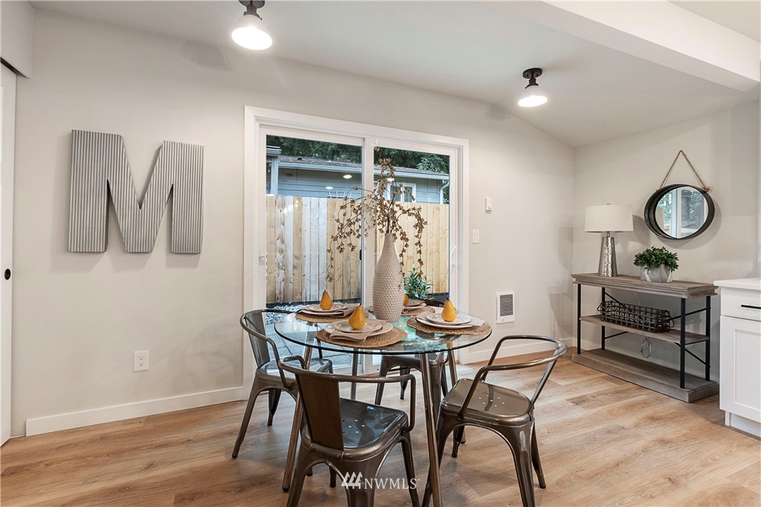 15 231st Street Southeast Bothell, WA 98021 - Photo 9 of 26 a view of a dining room with furniture