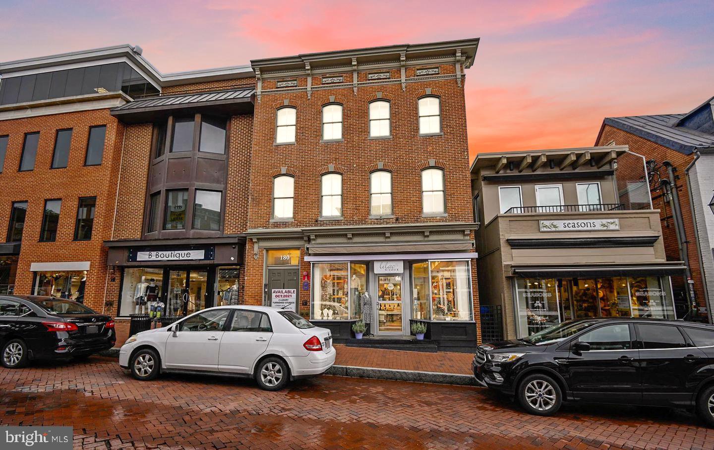 180 Main Street, Unit 202 Annapolis, MD 21401 - Photo 1 of 17 a car parked in front of a building