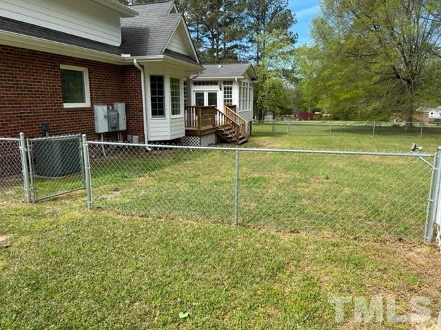 4820 Bluetick Road Raleigh, NC 27616 - Photo 32 of 36 a view of a house with a backyard