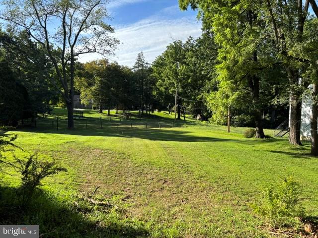 615 Spring Lane Philadelphia, PA 19128 - Photo 7 of 7 a view of a golf course with a trees