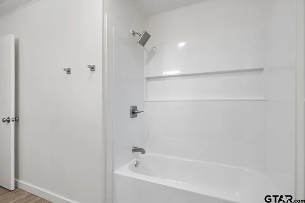 a bathroom with a bathtub