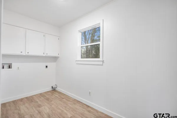 a view of a room that has a window in it