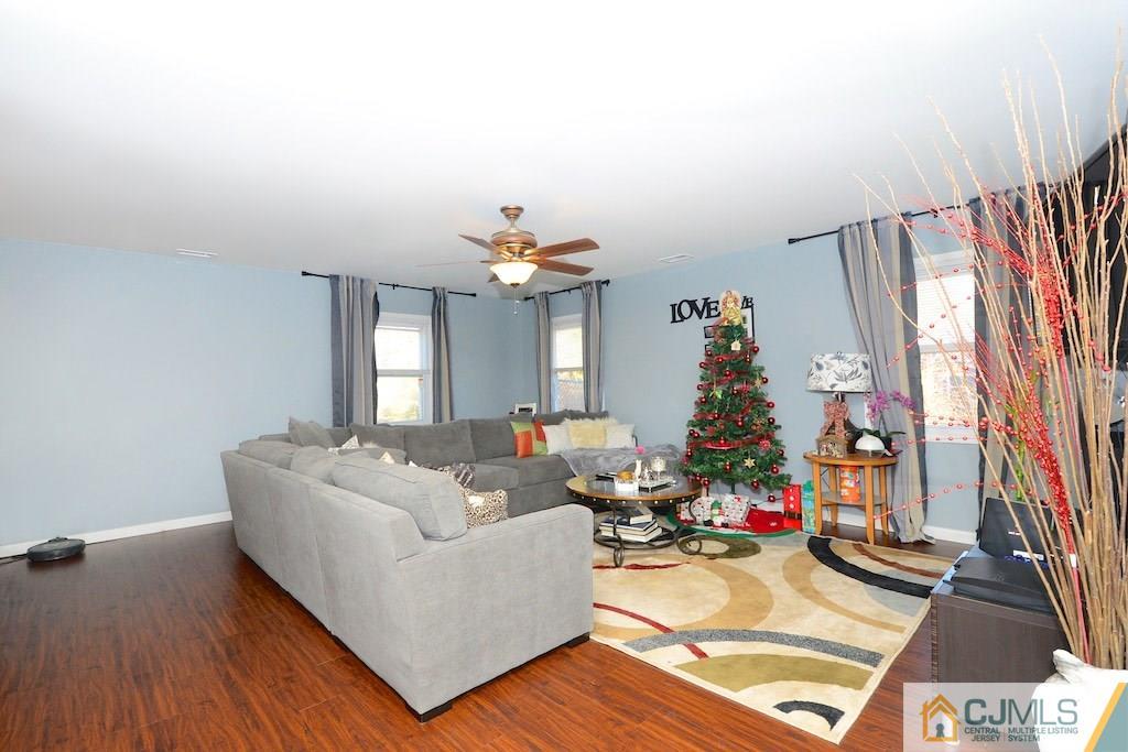 135 Drake Road Somerset, NJ 08873 - Photo 2 of 16 a living room with furniture and a wooden floor
