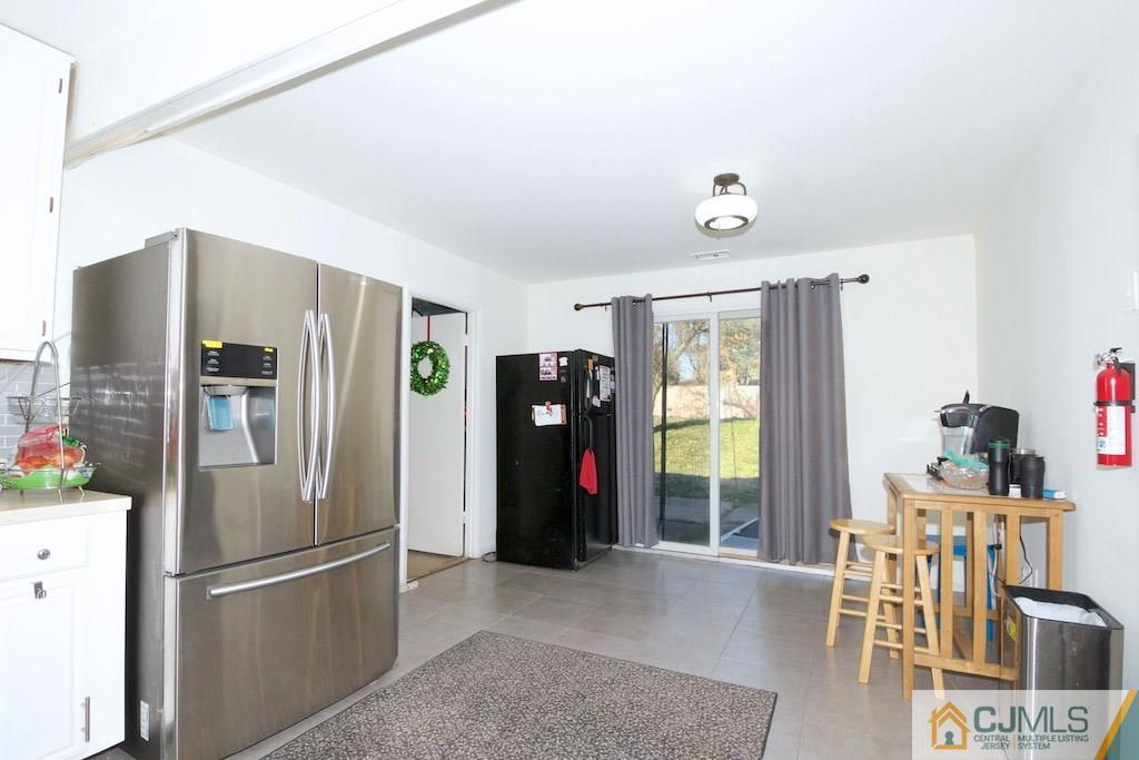 135 Drake Road Somerset, NJ 08873 - Photo 7 of 16 a kitchen with stainless steel appliances granite countertop a refrigerator and a refrigerator
