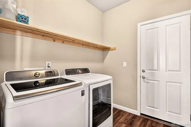 a utility room with dryer and washer
