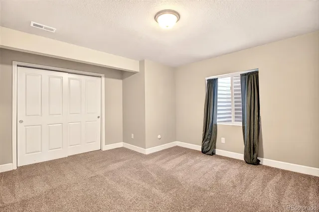 an empty room with window