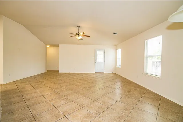 a view of an empty room and window