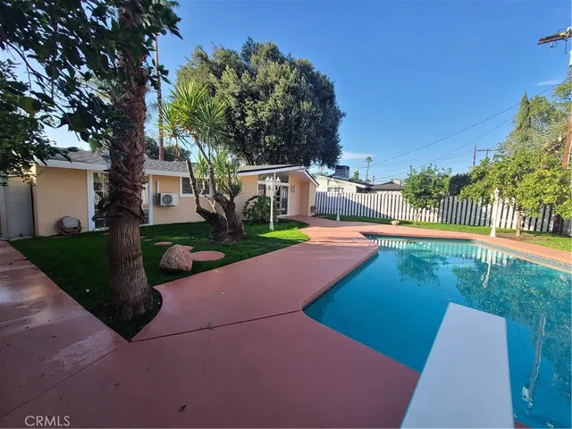 a house view with a garden space