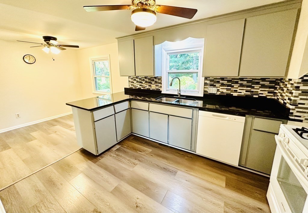 209 Birch Road Longmeadow, MA 01106 - Photo 6 of 13 a kitchen with stainless steel appliances a sink and a refrigerator