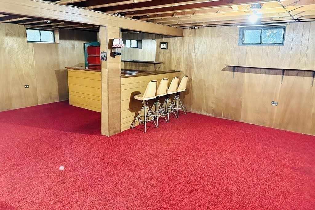 209 Birch Road Longmeadow, MA 01106 - Photo 10 of 13 a view of a room with furniture and a refrigerator
