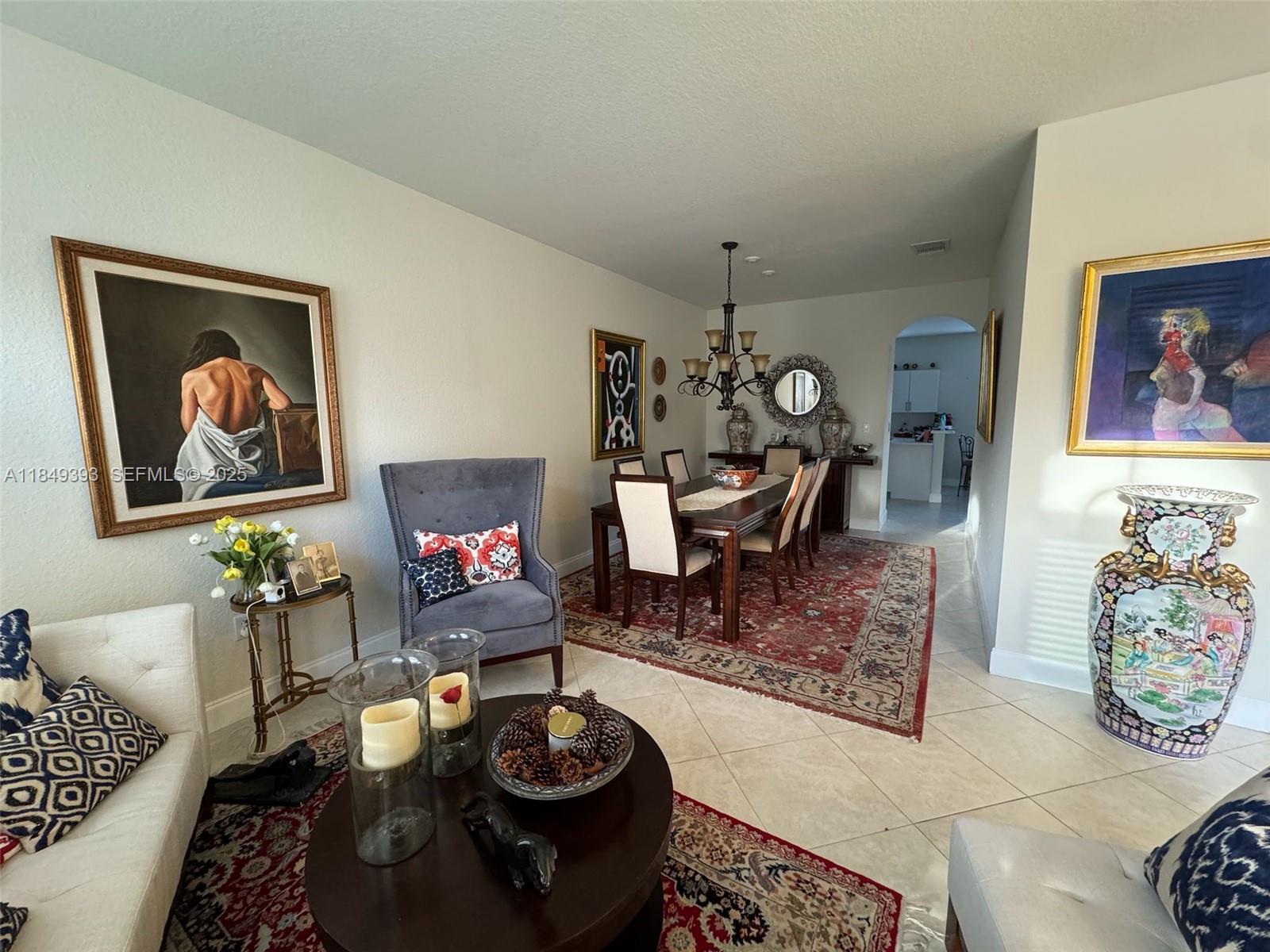 11575 Southwest 138th Avenue Miami, FL 33186 - Photo 5 of 23 a living room with furniture and wooden floor