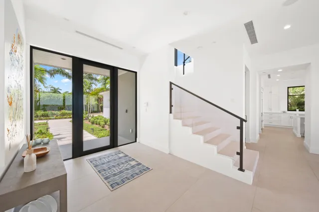 a kitchen with kitchen island granite countertop counter top space cabinets and stainless steel appliances