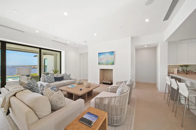 a spacious bedroom with a bed and large window