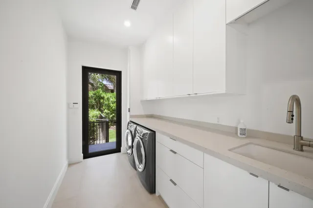 a bedroom with a bed wooden floor and window