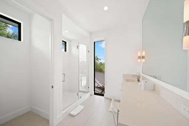 a front view of a house with swimming pool yard and outdoor seating