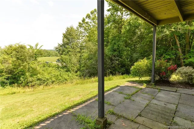 a view of a yard from a balcony