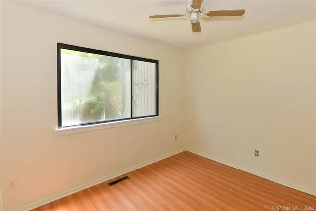 an empty room with a window