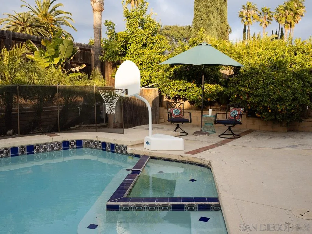 14018 Twin Peaks Road Poway, CA 92064 - Photo 24 of 27 a view of a chairs and table in the backyard