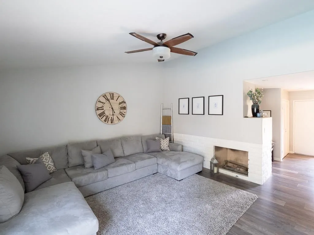 14018 Twin Peaks Road Poway, CA 92064 - Photo 6 of 27 a living room with furniture and a fireplace