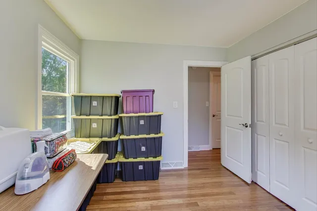 a room with furniture and a book shelf