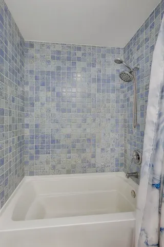 a bathroom with a bathtub