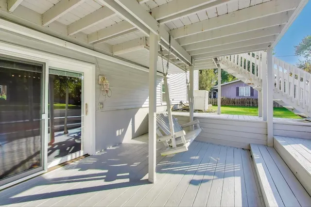 a view of a balcony with staircase
