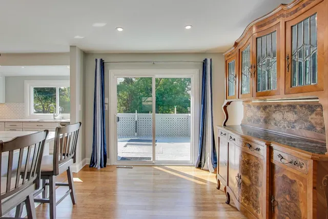 a view of a kitchen with furniture and a window