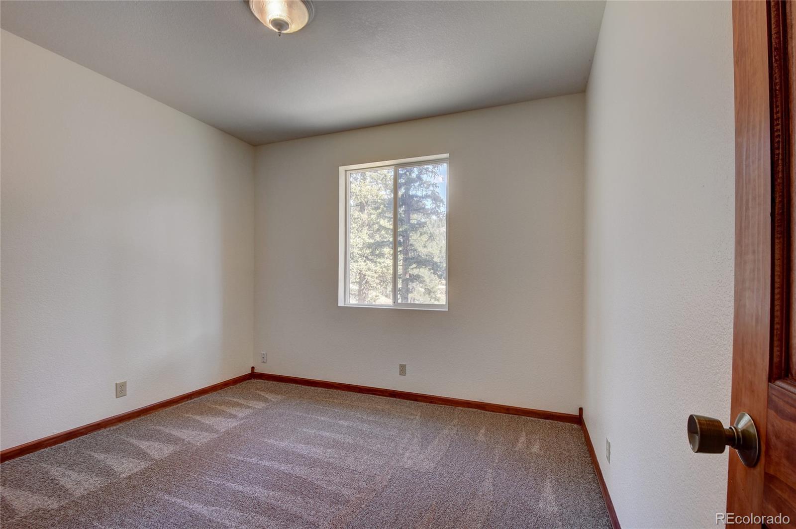 12399 South Foxton Road Conifer, CO 80433 - Photo 16 of 37
