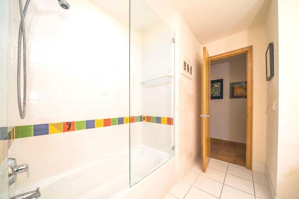 6761 Entrada Place Boca Raton, FL 33433 - Photo 50 of 69 a bathroom with a bathtub and a shower