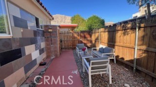 583 Calle Abronia South, Unit A Palm Springs, CA 92264 - Photo 2 of 19 a view of outdoor space seating area