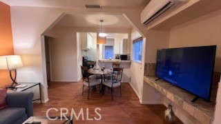 583 Calle Abronia South, Unit A Palm Springs, CA 92264 - Photo 3 of 19 a view of a dining room with furniture