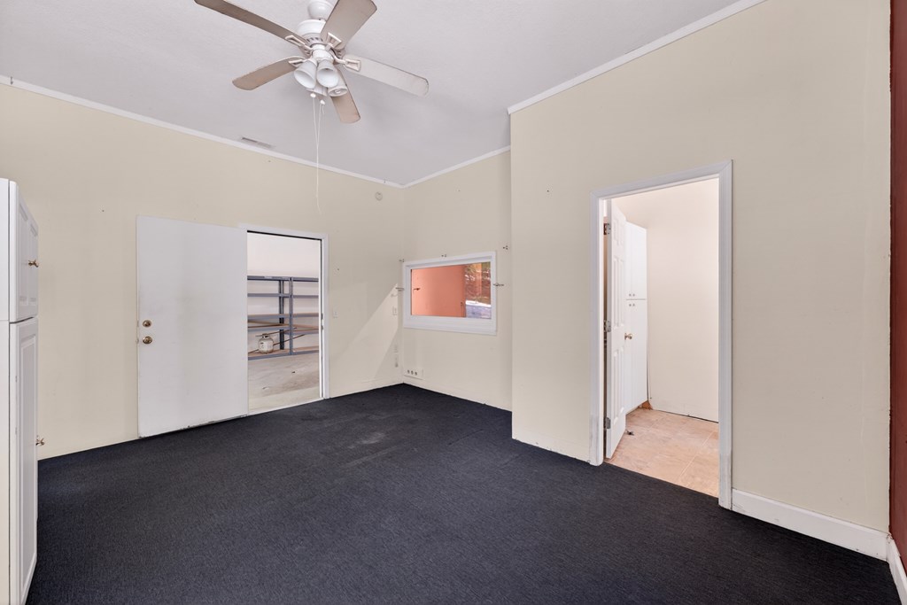 282 West Cherry Road Hayesville, NC 28904 - Photo 32 of 45 an empty room with windows and fan