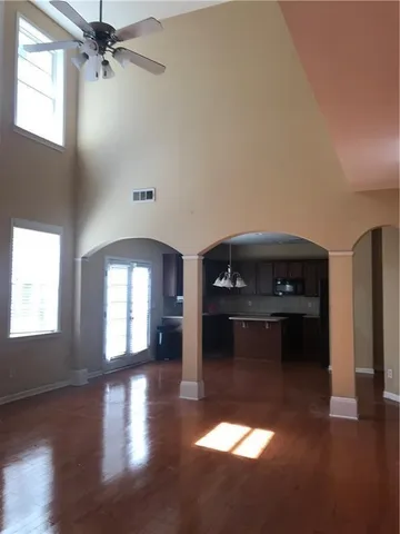 a view of livingroom and kitchen with hardwood floor