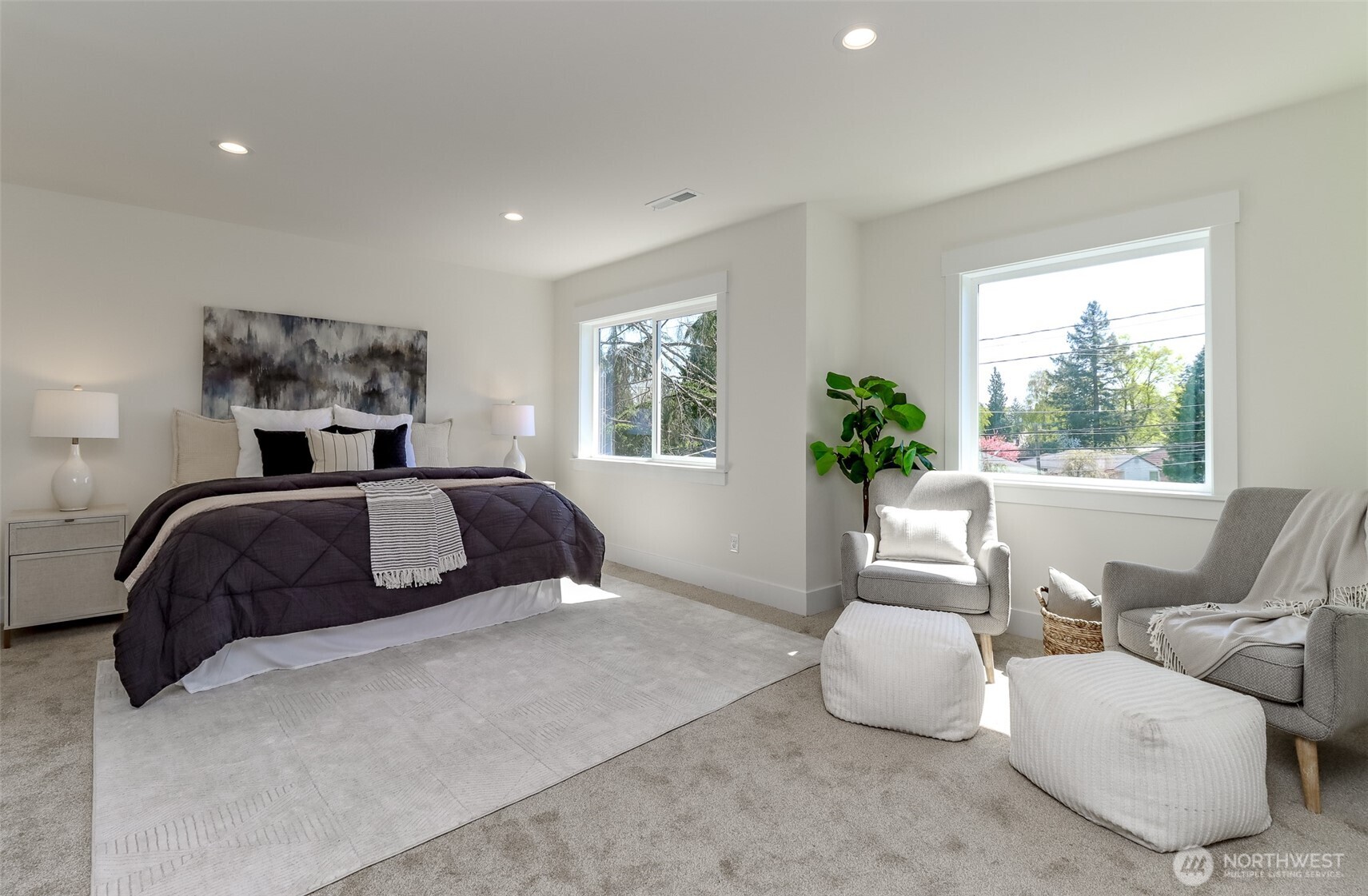 124 South 108th Place Seattle, WA 98168 - Photo 21 of 38 a bedroom with a bed and glass window