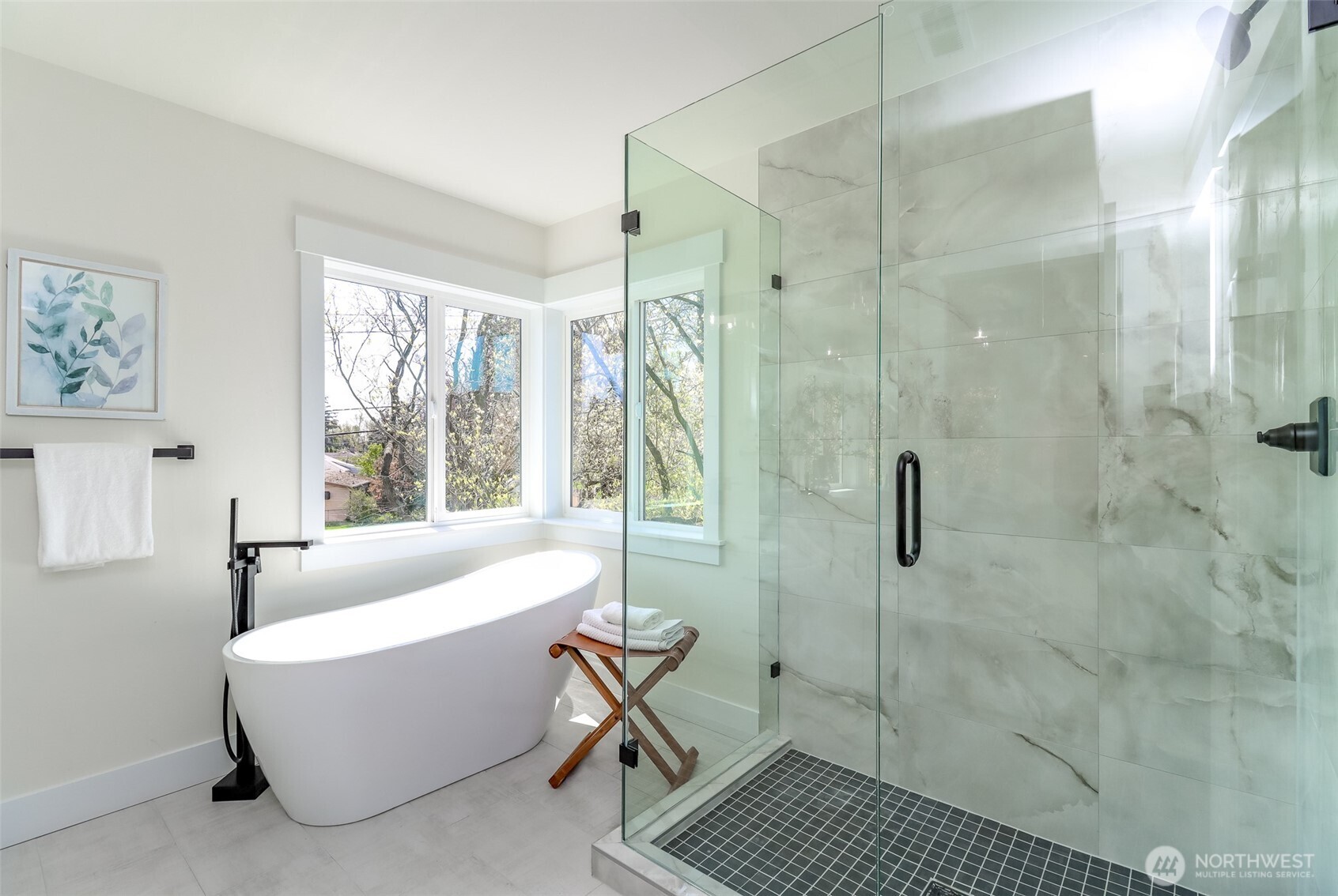 124 South 108th Place Seattle, WA 98168 - Photo 24 of 38 a bathroom with a bathtub a toilet and a shower