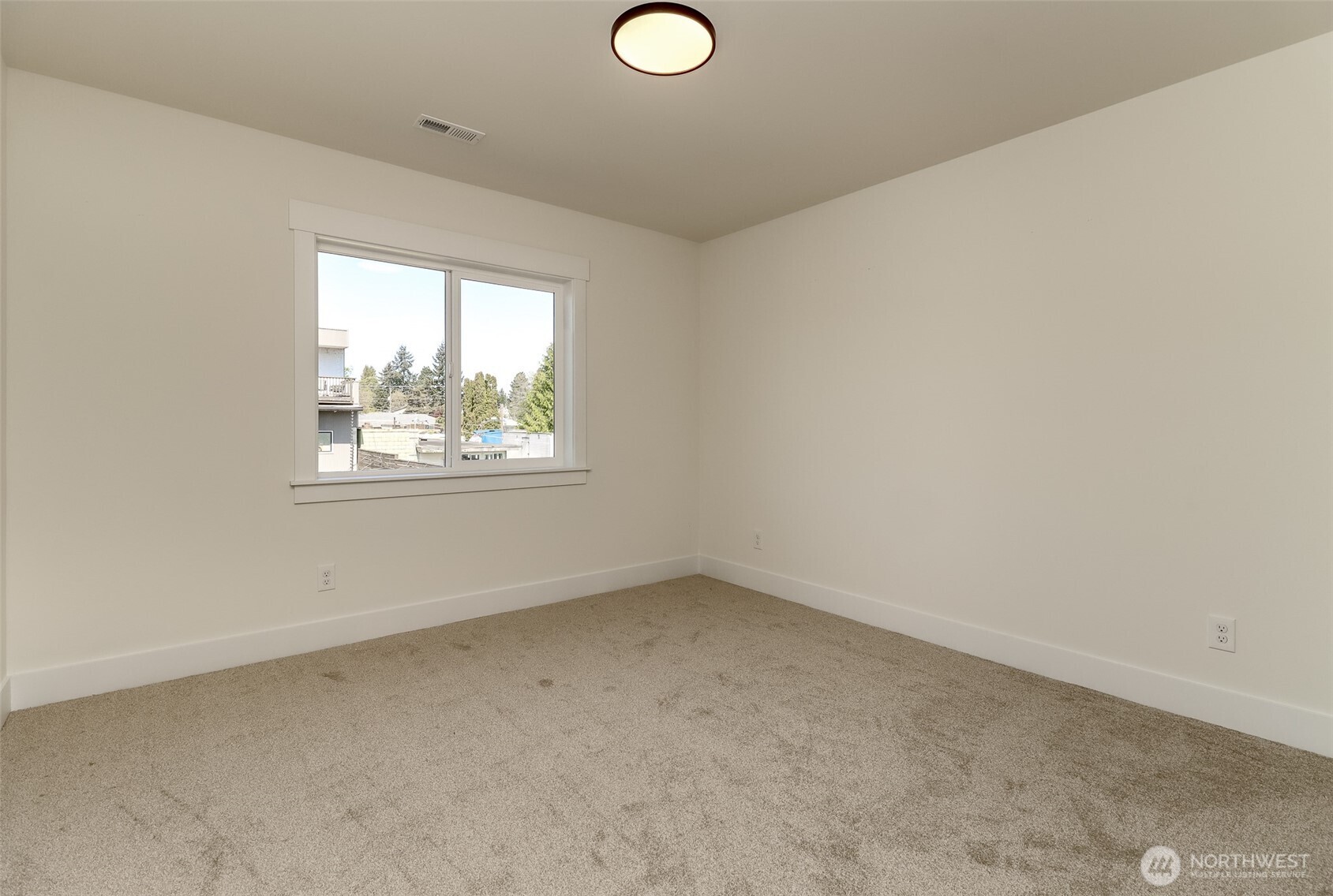 124 South 108th Place Seattle, WA 98168 - Photo 31 of 38 an empty room with windows